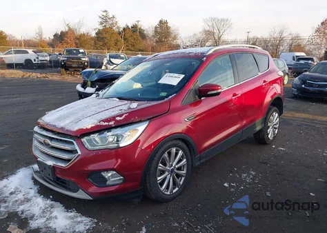 2017 Ford Escape Titanium из США, поврежденный, VIN 1FMCU9J9XHUB00304